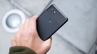 Black Google Pixel 2 XL in hand